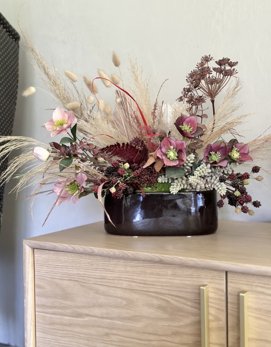 Box of artificial flowers...